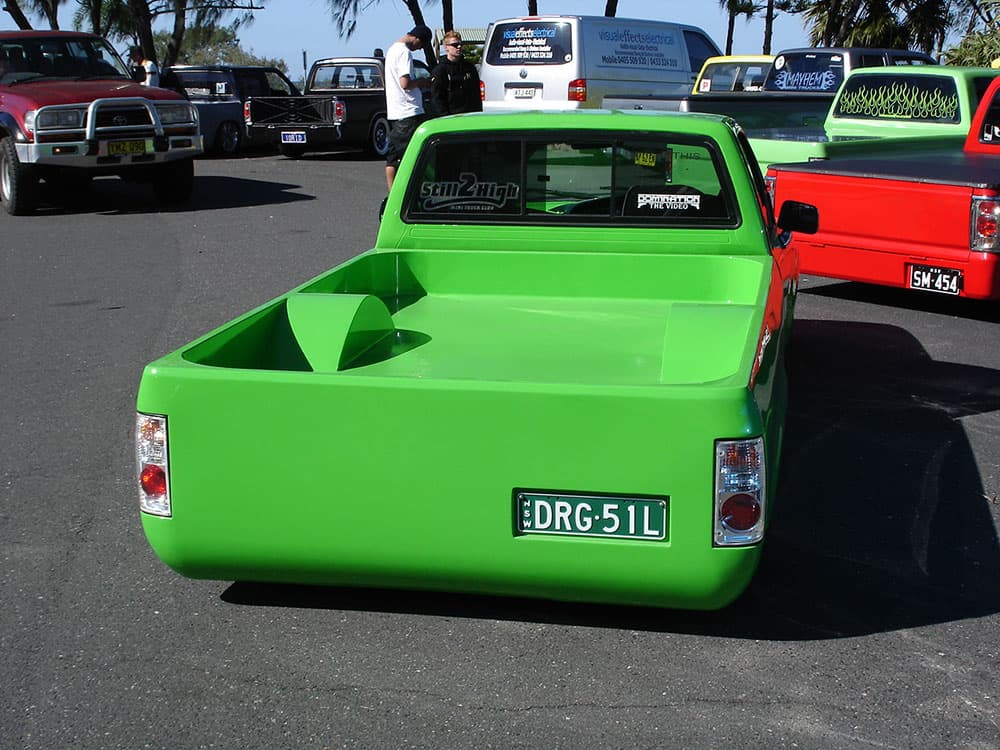 Rear view of lime green custom minitruck with geometric bed modifications at coastal gathering at Half Way Havoc 2006 Nambucca Heads NSW - Minitruck Show Photos