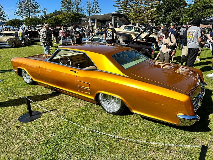 Convertible lowrider with white interior at Lowrider Sunday 2023