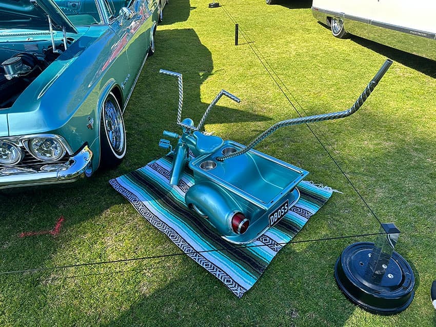 Classic car with hydraulics and custom paint at Lowrider Sunday 2023